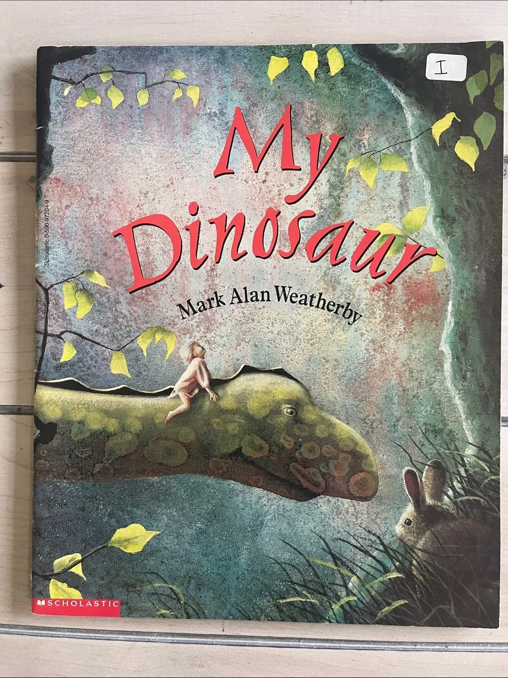 Set of 4 Dinosaur themed books, fiction and non-fiction